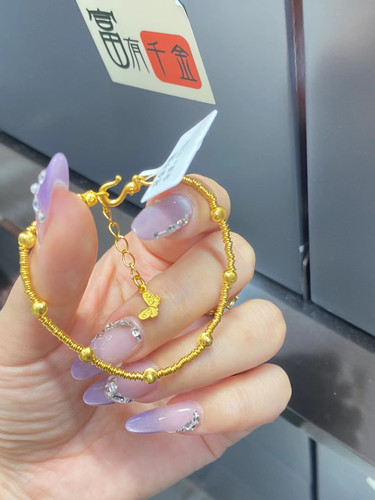 水贝黄金 足金999小红书同款网红猫眼珠盘缠手链手串按克卖实时价
