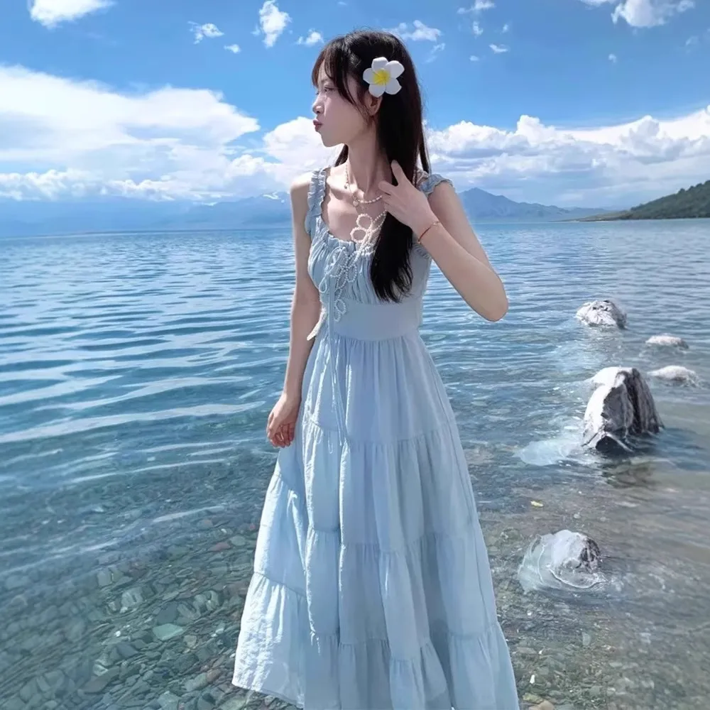 法式茶歇蓝色吊带连衣裙子女夏季2025新款温柔早春装气质修身长裙