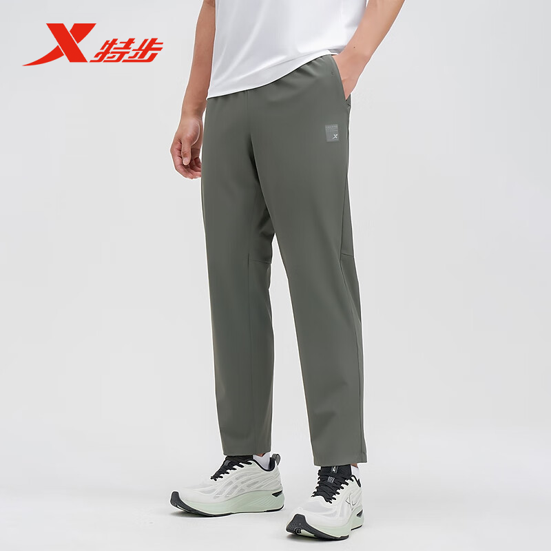 特步梭织九分裤2025夏新款男梭织弹性冰丝透气运动裤975229690548