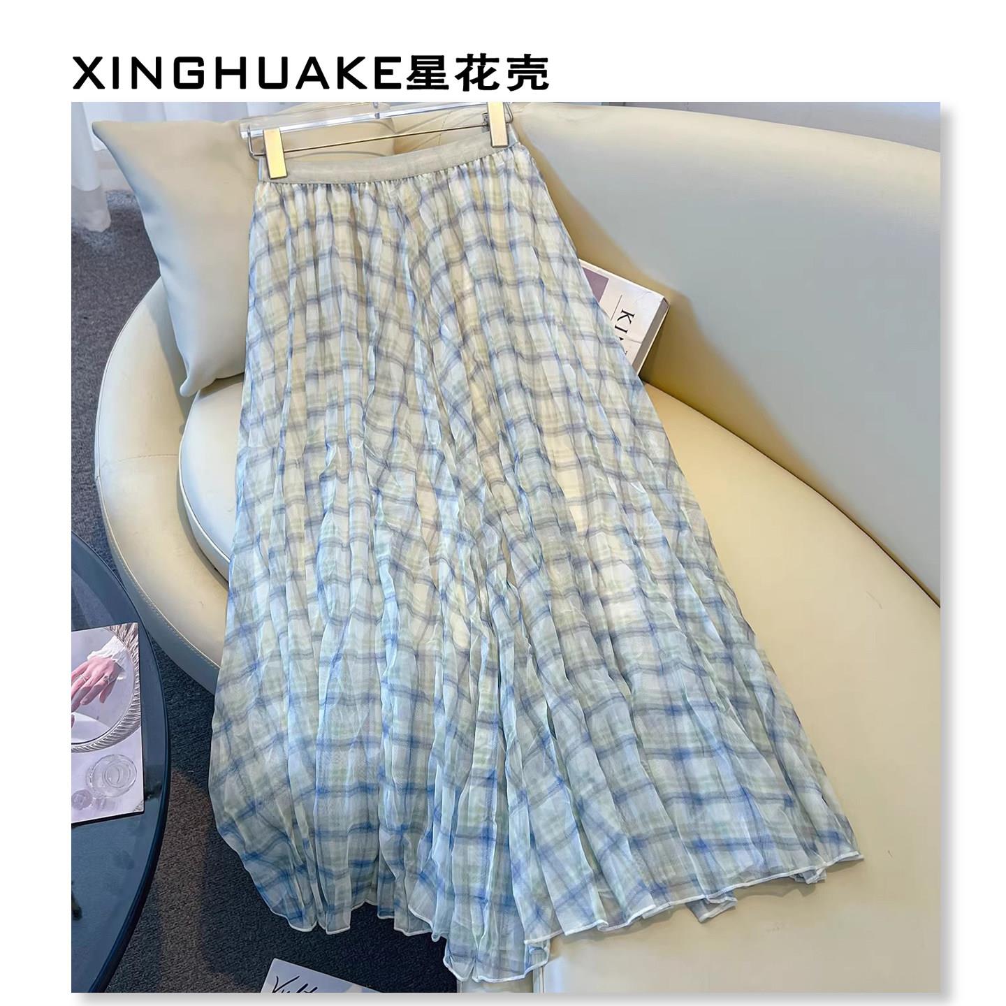 蓝绿格子印花网纱半身裙女2026春季新款高级感法式收腰百褶中长裙
