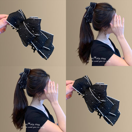 懒人神器~黑色蝴蝶结波点香蕉夹