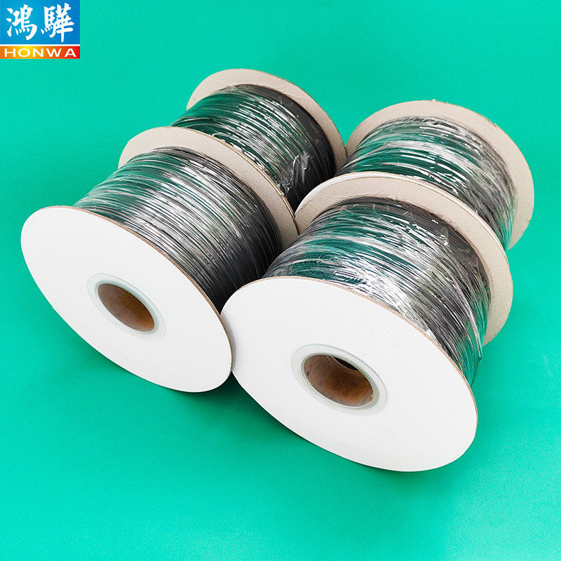 供应扎线机用pe包塑椭圆形扎带打卷带轴白色椭圆形包胶铁扎线