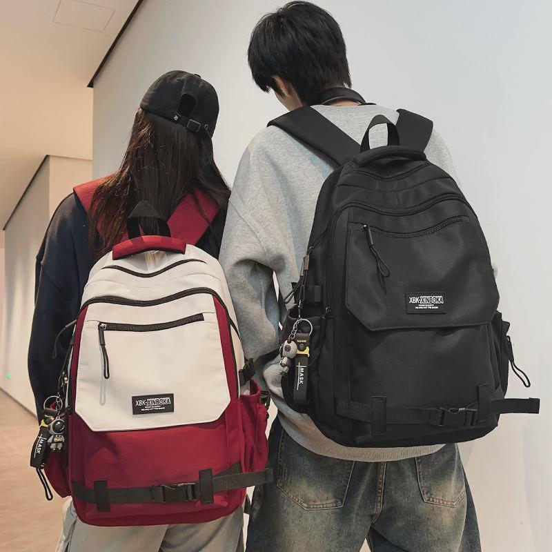 撞色大容量双肩包男休闲百搭初中生高中旅行背包大学生电脑书包女