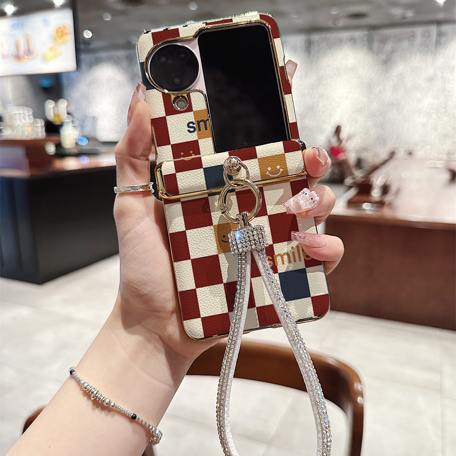 红白格子笑脸荔枝纹折叠屏手机壳