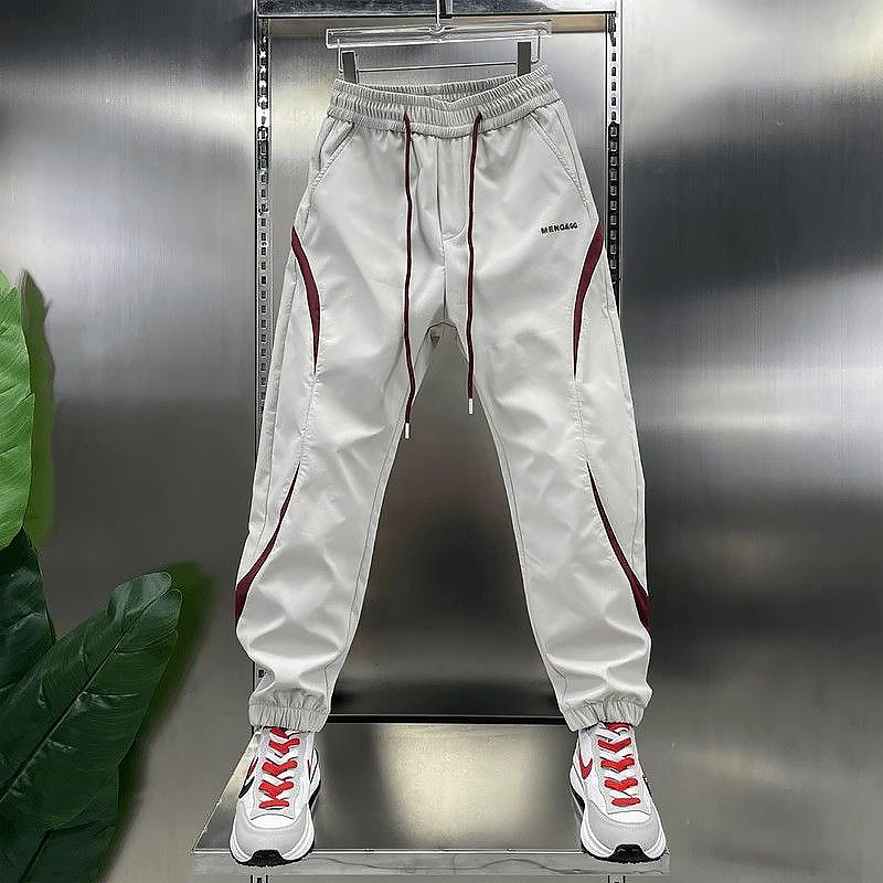 春夏薄款撞色拼接休闲裤男潮牌松紧腰束脚裤运动工装小脚九分长裤