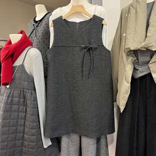 韩版简约无袖连衣裙2025冬季新款蝴蝶结A字裙洋气羊毛呢背心短裙