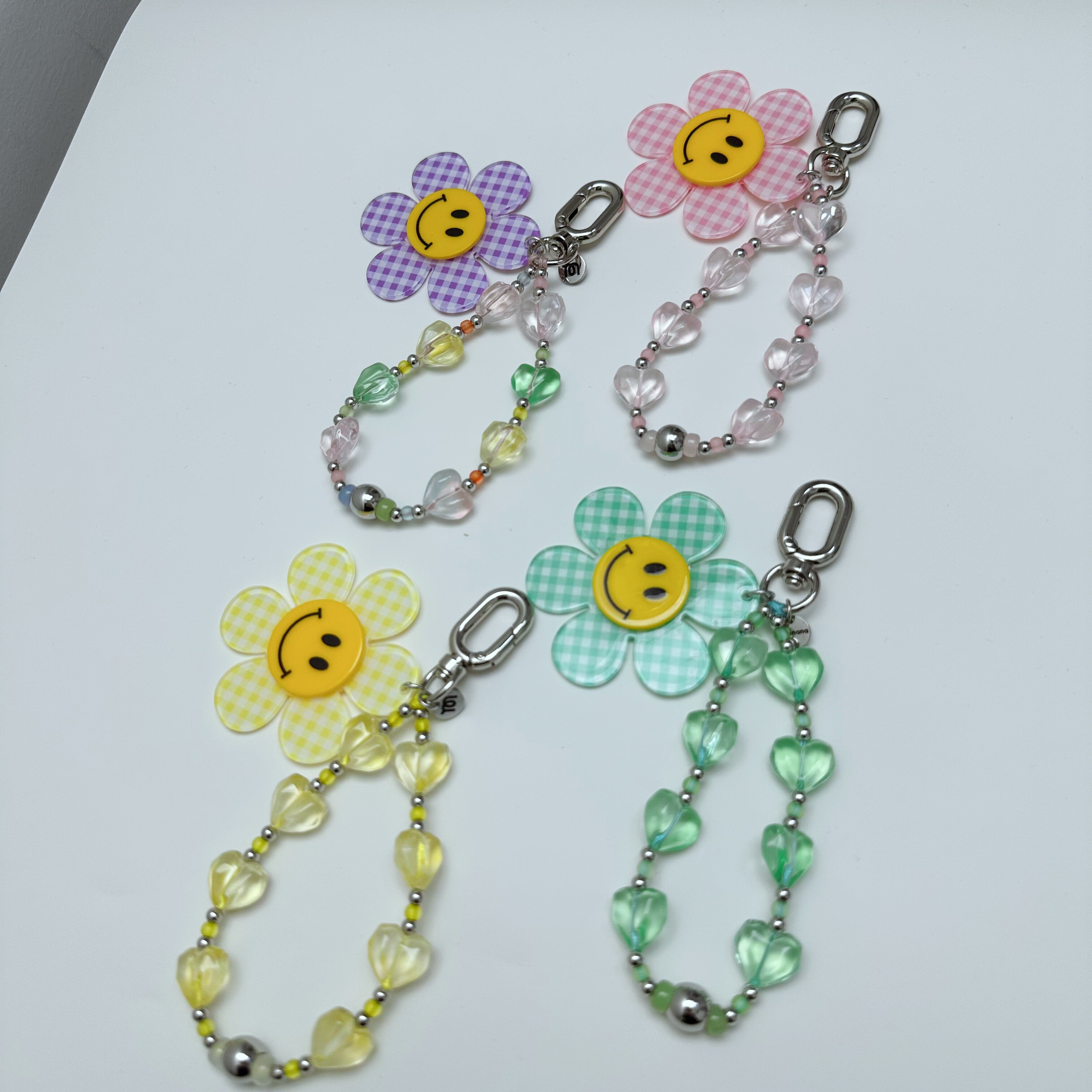 美娜娜太阳花水晶手机挂链苹果包适用iPhone短meinana手机壳挂饰