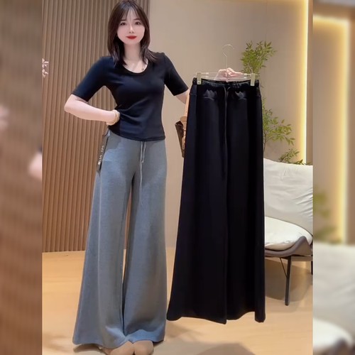 时尚慵懒风黑色微喇裤女