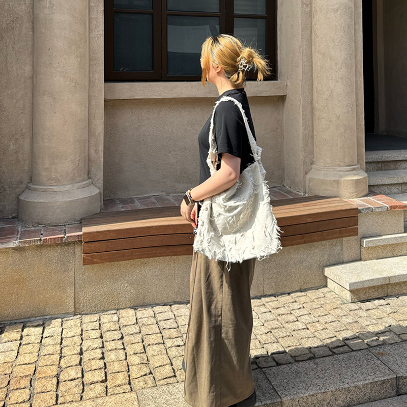 棉麻白单肩斜挎包咩奇流苏简约