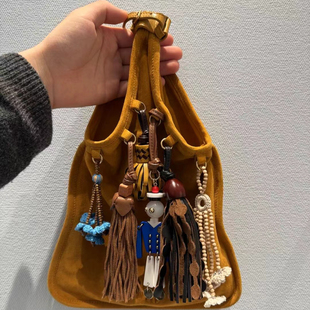 头层麂皮翻毛皮真皮手拎小包机器人流苏趣味福袋包单肩斜挎包包女