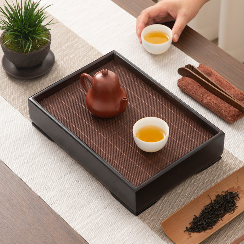 一人饮竹席茶盘茶杯茶具托盘竹茶图片