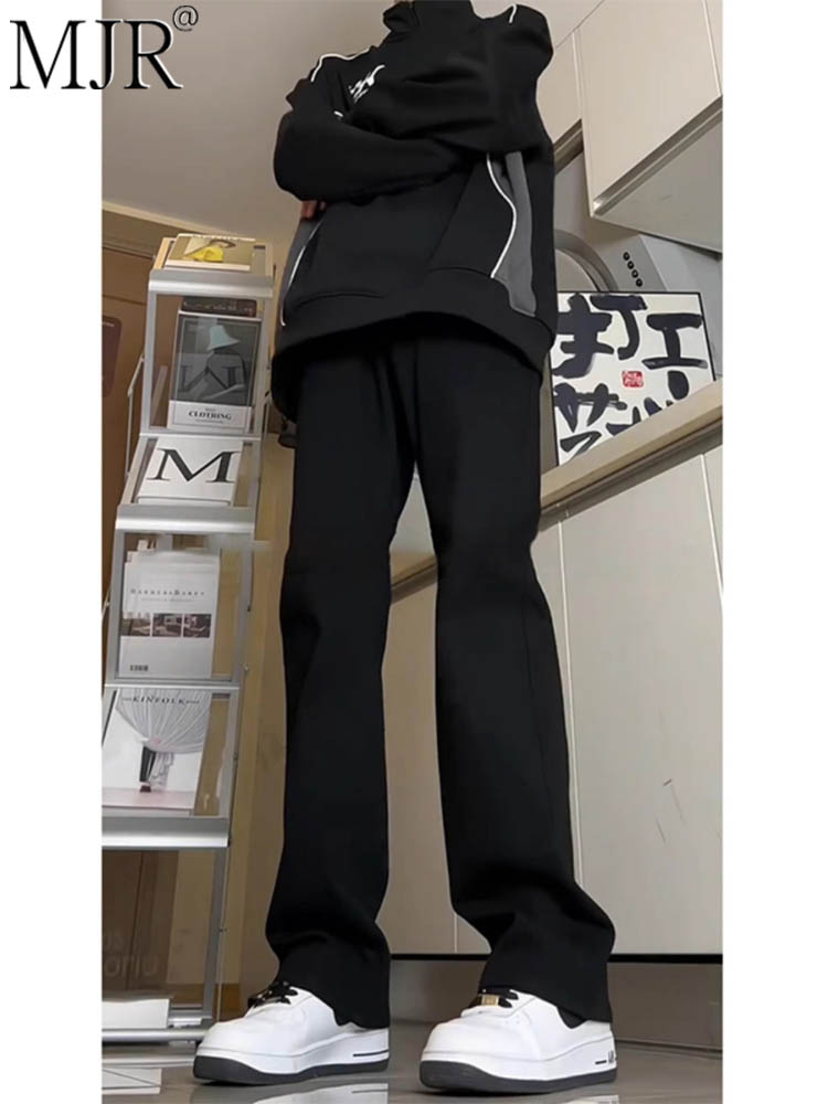 潮牌纯黑色牛仔裤男款春秋冬季新款美式弯刀裤子弹力修身微喇男裤