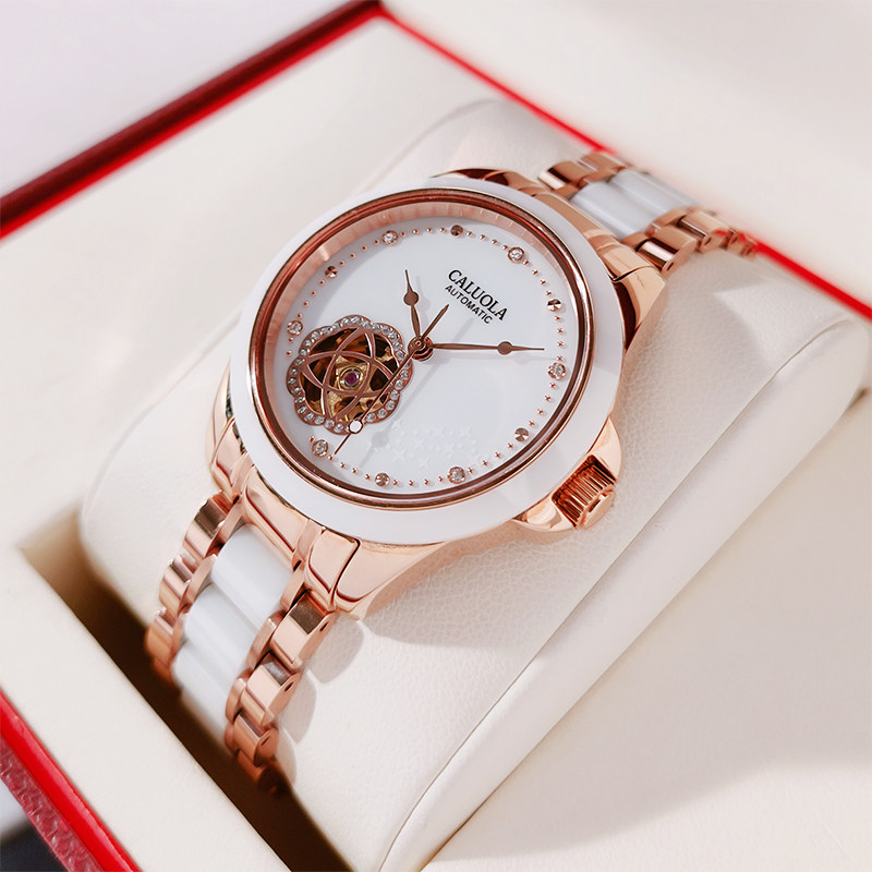 卡罗莱手表女机械表时尚镂空机械女表白色陶瓷女士手表防水