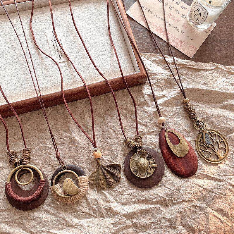 设计感帽子民族风水滴形项链女树叶圆形锁骨链复古木头毛衣链吊坠