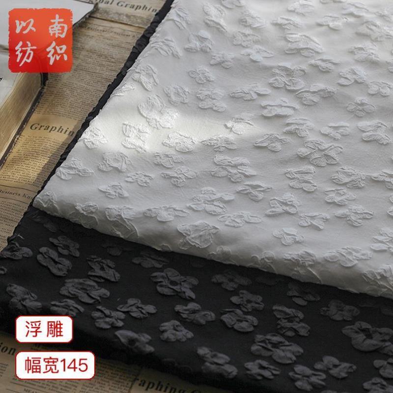 黑白四面弹浮雕花朵泡泡提花面料梭织日韩时尚连衣裙箱包布料现货