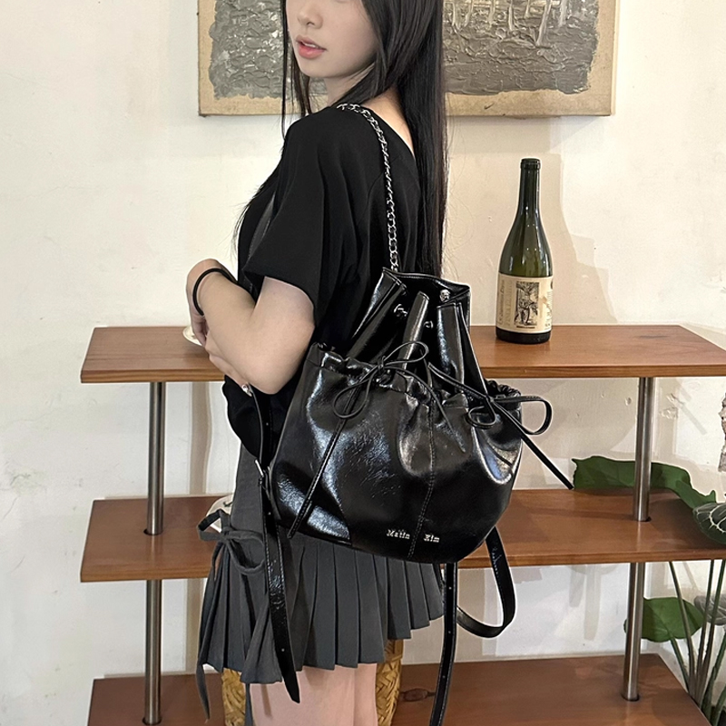 韩国小众品牌matin kim双肩包包女款超软蝴蝶结抽绳链条水桶背包