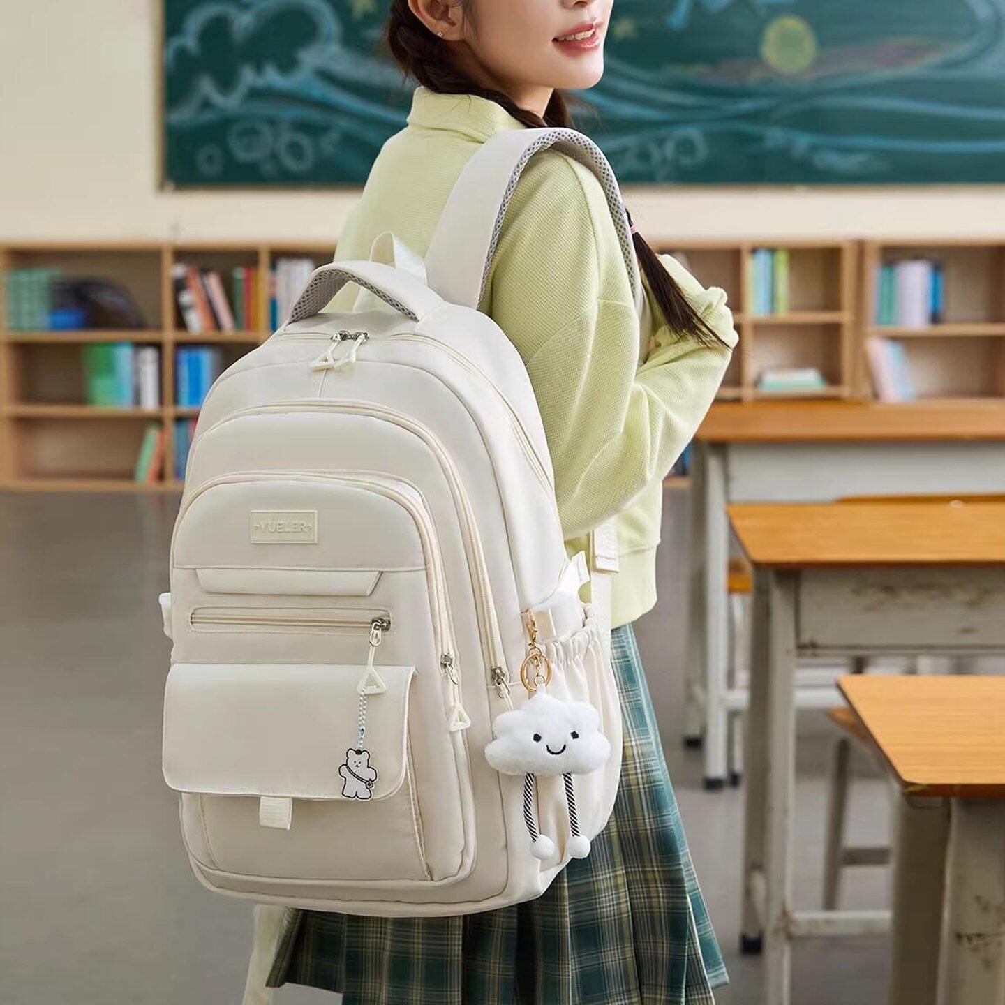 减负护脊书包女学院风双肩背包女生大容量初中生小学生三到六年级