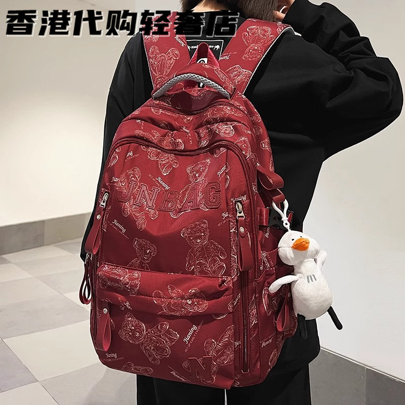 法国MKBM新款书包初中高中生减负护脊双肩包印花大容量电脑背包潮