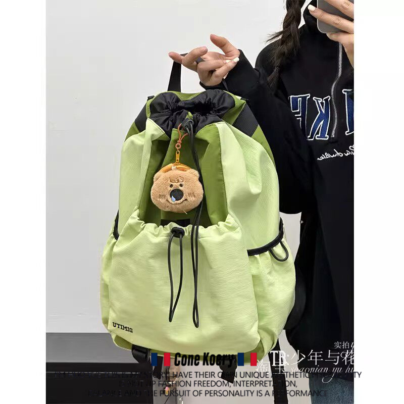 罗予彤同款户外徒步包女抽绳束口防泼水登山背包羽毛球包男电脑包