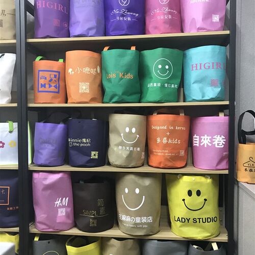 服装店圆底水桶袋无纺布手提袋可印logo新款圆桶袋环保购物袋订制