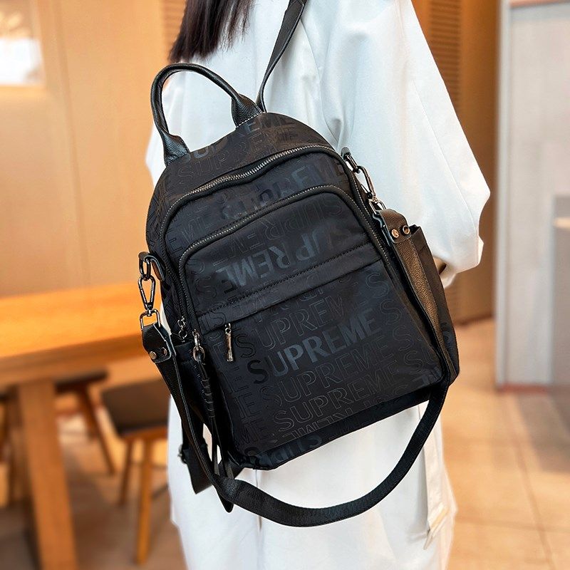 时尚印花牛津布双肩包女2024新款休闲轻便防水大容量旅游背包两用,箱包皮具/热销女包/男包,双肩背包,淘宝优惠券,粉丝福利购,淘宝优惠卷