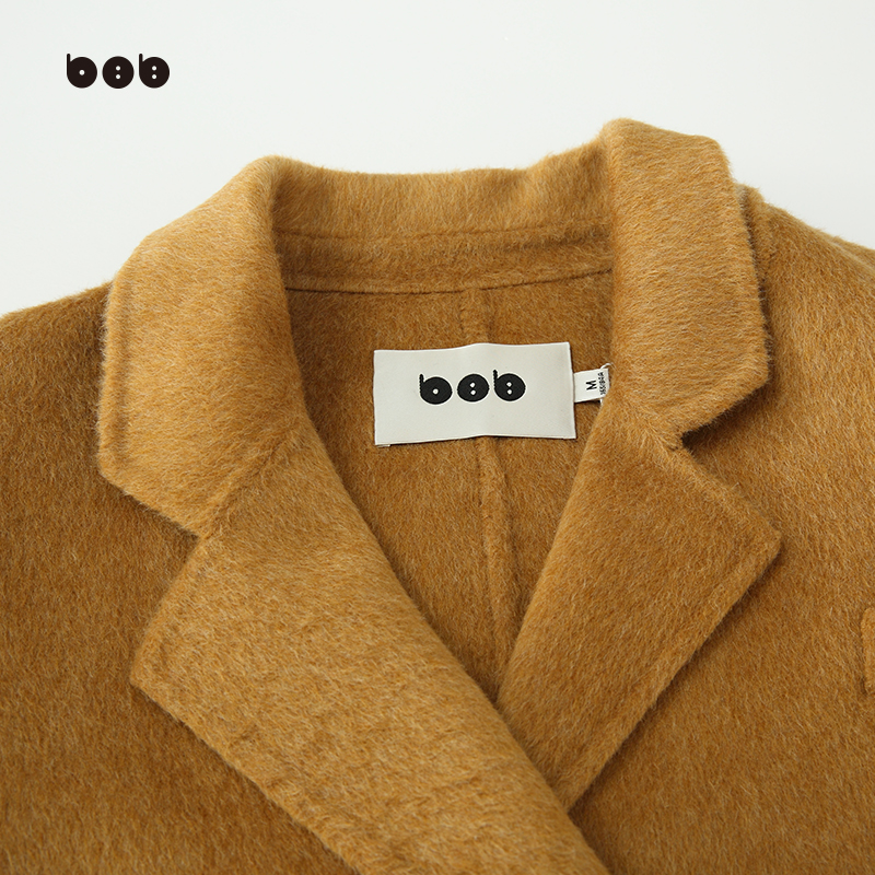 白目自原创设计毛呢外套