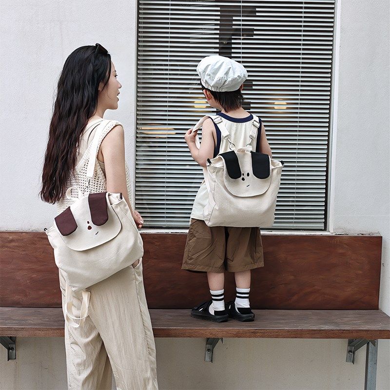 幼儿园小学生书包儿童可爱大容量双肩包男女童帆布斜挎包亲子背包
