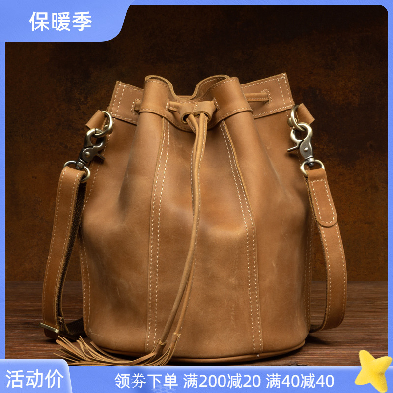 复古牛皮水桶包女真皮包包耐磨2023新款复古大容量单肩斜挎包抽绳