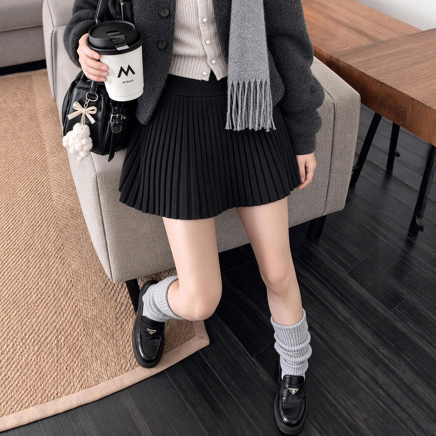 黑色毛呢半身裙女秋冬季2026新款高腰小个子a字蓬蓬百褶miu系短裙