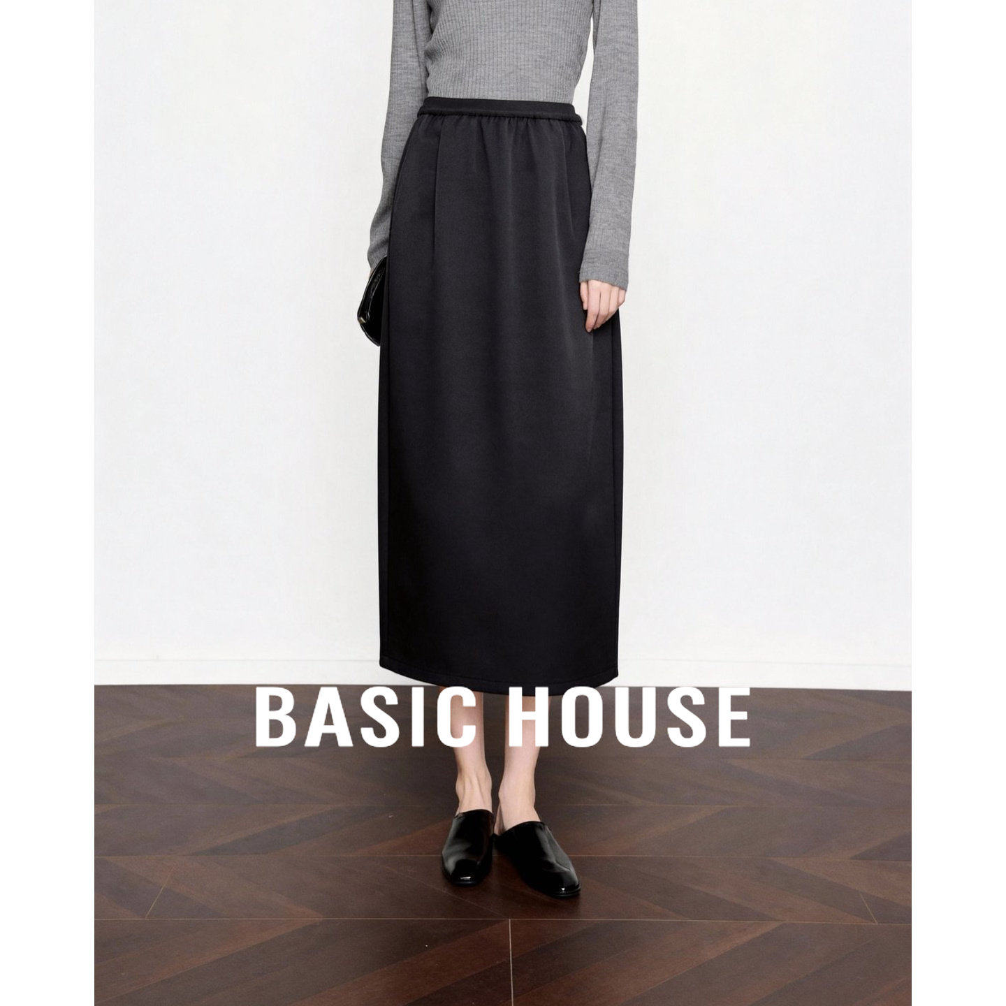 百家好黑色松紧腰半身裙春季新款垂坠感宽松显瘦中长通勤直筒裙女