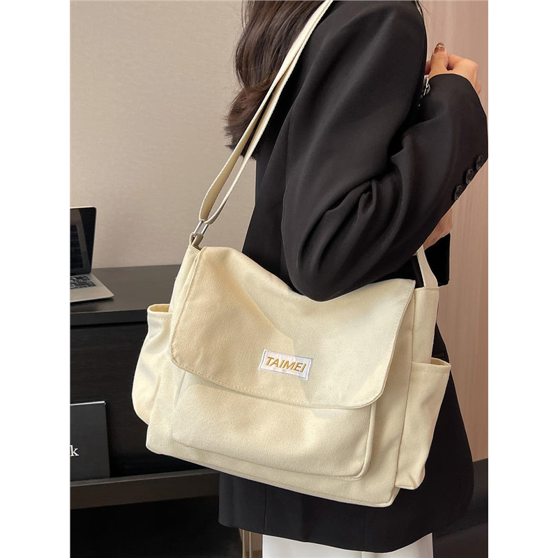 帆布包高级感小众包包女式2026新款超火上学大学生通勤单肩斜挎包