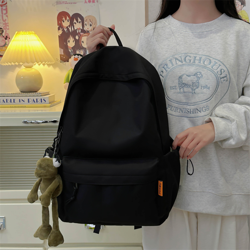 书包女大学生初中女生背包旅游轻便简约高中生大容量新款双肩包男