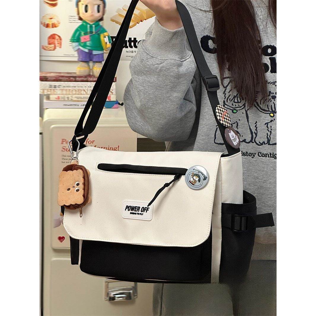 75885113法国百搭装风斜工挎包女 大学上课休生闲包背包单肩差男
