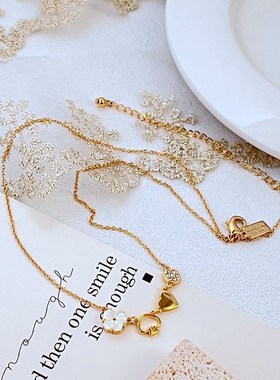 新款时尚b轻奢通勤小众甜美花朵 镂空黑桃 爱心 圆形多坠金属项链