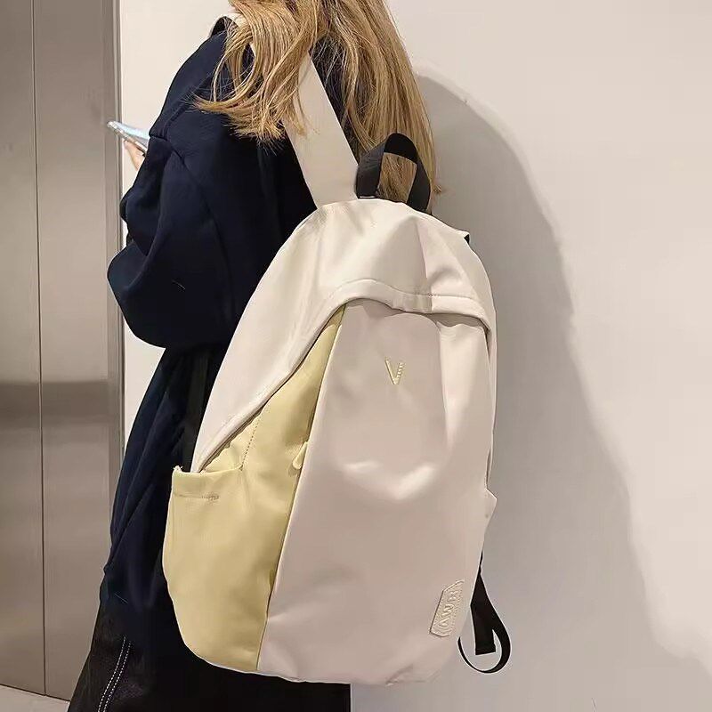 品质双肩包2024新款女初中背包大学生旅行大容量帆布轻便书包女