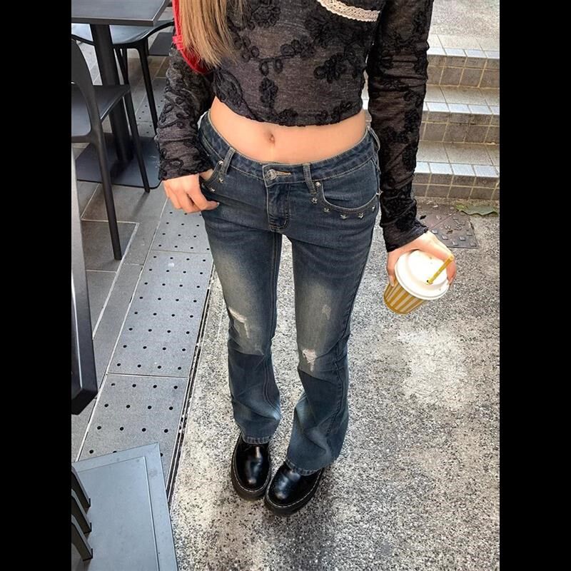 美式复古辣妹破洞牛仔裤女春秋款铆钉设计感高街修身显瘦微喇叭裤