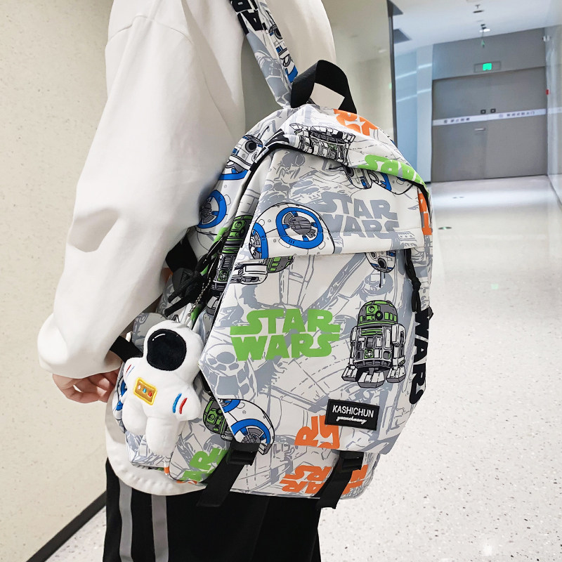 书包男生小学生五六年级涂鸦双肩包初中生男款青少年太空人背包潮