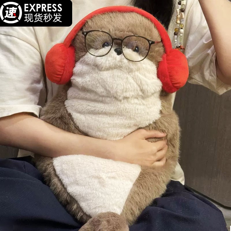 可爱耳机海豹玩偶睡觉抱公仔毛绒玩具海獭抱枕娃娃生日礼物圣诞节