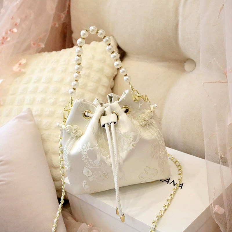 小众设计新中式国风串珠流苏水桶包包珍珠手提单肩斜挎2025春新款