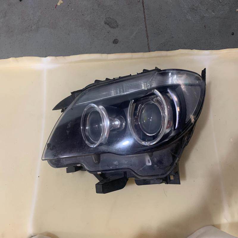 议价出宝马7系E66大灯总成，轻微使用痕迹，原装4.5