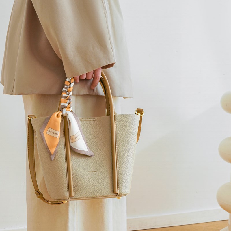 高级质感手提包包女2024新款小众单肩水桶包百搭通勤斜挎菜篮子包