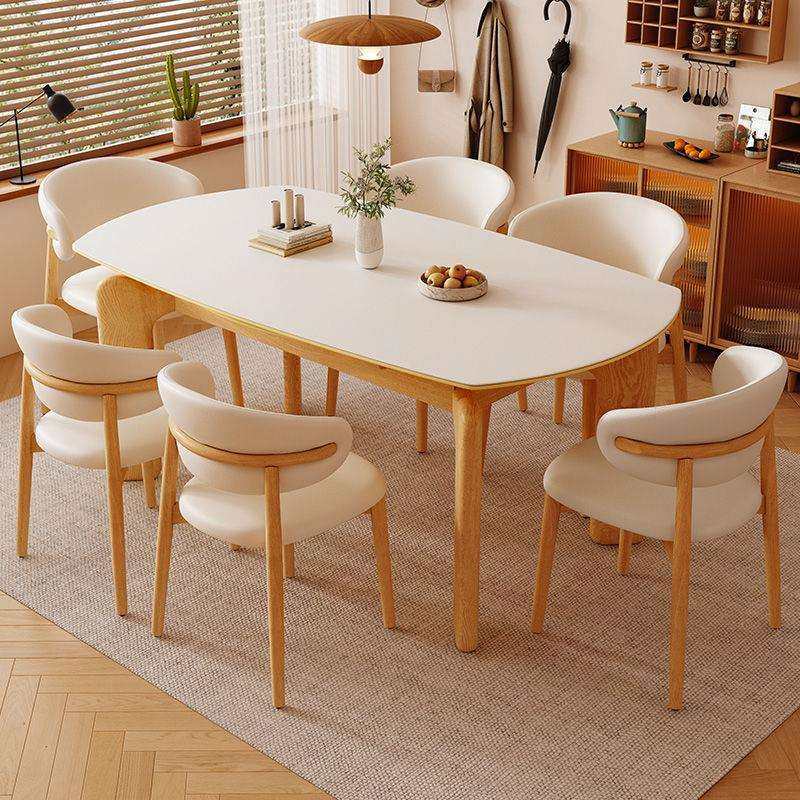 大象腿北欧实木餐桌家用原木色黑色方圆两用可伸缩小户型岩板餐桌