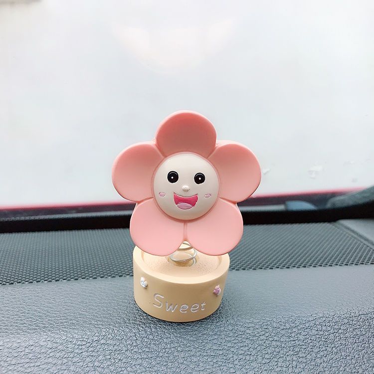 车载中控台弹簧摇头向日葵摆件可爱太阳花汽车内饰装饰用品