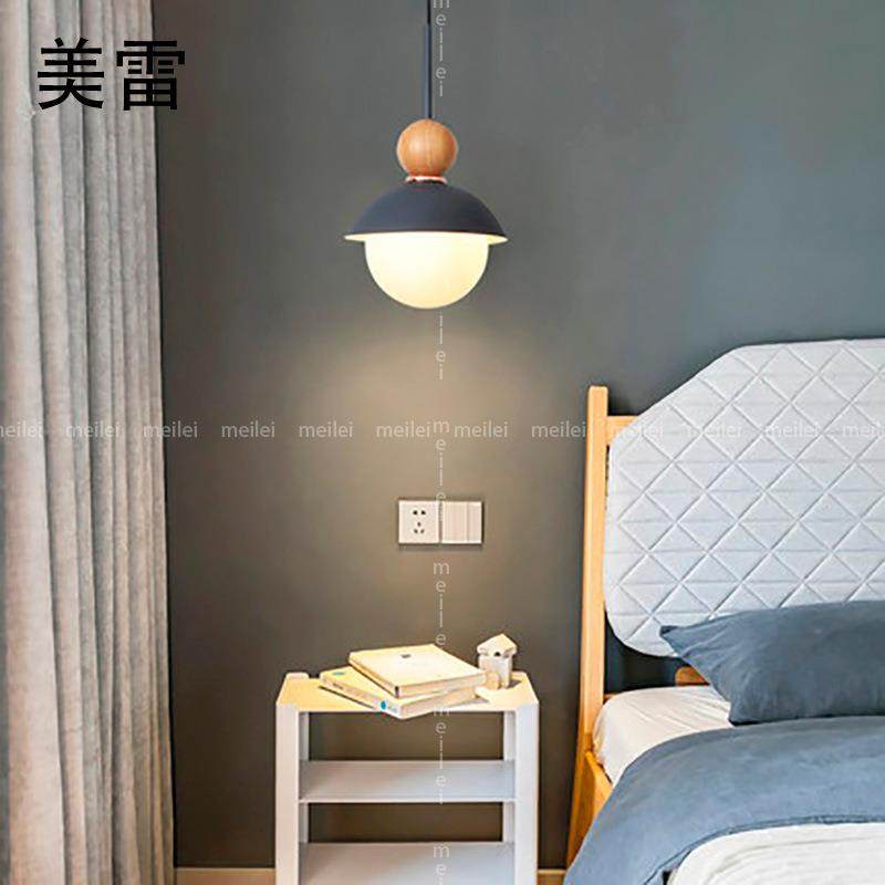 北欧风格单头餐厅吊灯简约现代创意实木马卡龙主卧室书房床头灯具