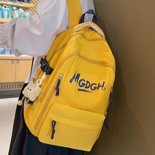 黄色字母双肩包初中生高中生大学生大容量轻便高颜值书包女生背包