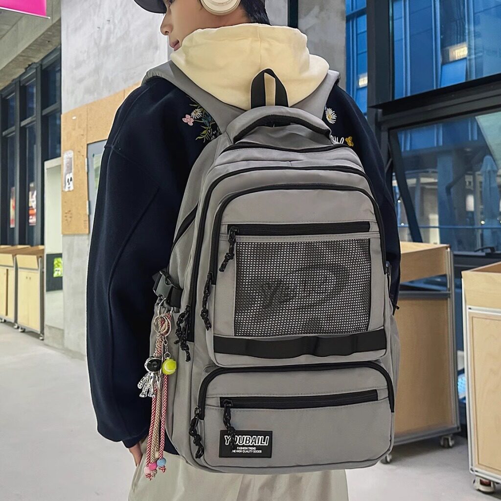 日系工装潮牌大容量双肩包男简约百搭电脑背包初中高中学生书包女