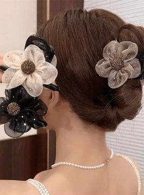 抓夹头花发饰2025新款太阳花水钻花朵高级感扎马尾丸子头盘发神器