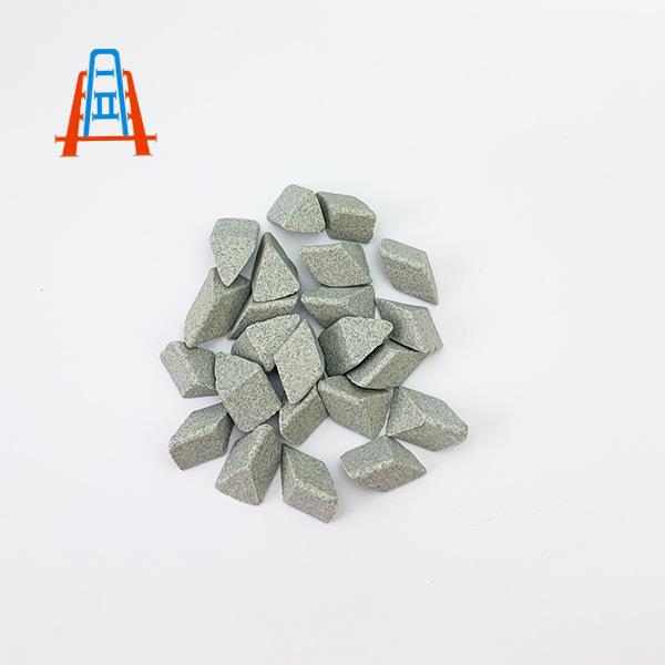 厂家提供斜三角斜圆柱圆球形棕刚玉磨料研磨石抛磨块粗磨填料粗磨