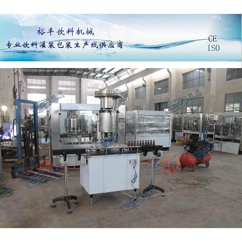 厂家供应2000瓶每小时啤酒盖压盖机（玻璃瓶，皇冠盖）