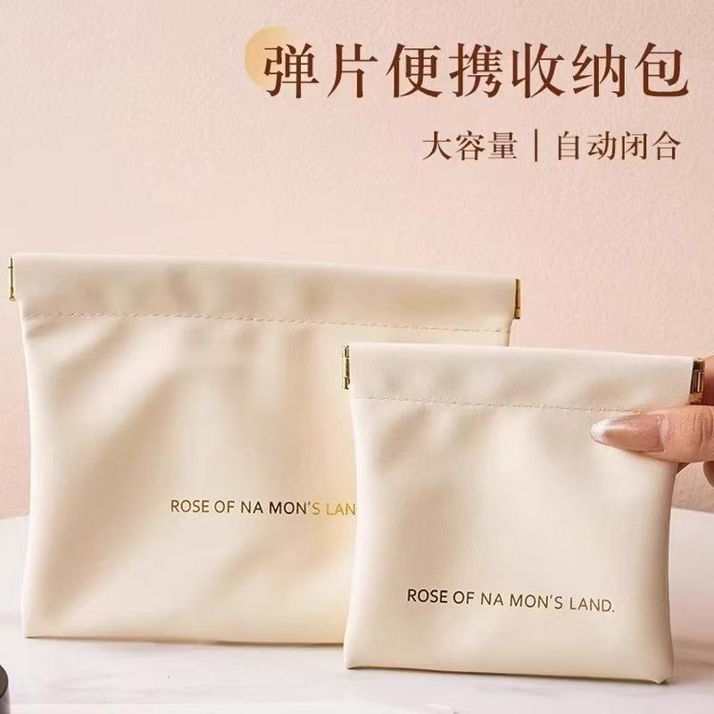 弹片收纳包自动闭合有线耳机收纳袋PU零钱包迷你便携式口红化妆包